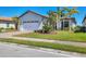 Charming single-Gathering home with a well-manicured lawn and a three-car garage at 510 16Th E Ave, Palmetto, FL 34221