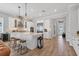 Bright kitchen featuring white cabinetry, large island with seating, and stainless steel appliances at 510 16Th E Ave, Palmetto, FL 34221