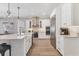 Contemporary kitchen featuring a large island, stainless steel appliances, and modern lighting at 510 16Th E Ave, Palmetto, FL 34221