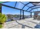 Spacious screened lanai with waterfront views, perfect for outdoor relaxation and enjoying the scenic surroundings at 510 16Th E Ave, Palmetto, FL 34221