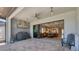Expansive outdoor living space with a fully equipped kitchen, patio, and open layout to an indoor living space at 510 16Th E Ave, Palmetto, FL 34221