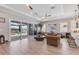 Bright and airy living room with sliding glass doors to the outside and stylish decor at 510 16Th E Ave, Palmetto, FL 34221