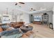 Open-concept living room showcasing a modern design with wood floors and recessed lighting at 510 16Th E Ave, Palmetto, FL 34221