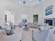 Bright lobby with high ceilings, comfortable seating, and a cozy fireplace creating an inviting and sophisticated atmosphere at 510 16Th E Ave, Palmetto, FL 34221