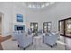Bright and airy lobby with high ceilings, elegant seating, fireplace, and an abundance of natural light at 510 16Th E Ave, Palmetto, FL 34221