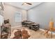 Bright office space featuring a brick accent wall, wood floors, and contemporary furnishings, perfect for productivity at 510 16Th E Ave, Palmetto, FL 34221