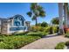 Community signage for Sanctuary Cove, bordered by manicured landscaping and brick pathway at 510 16Th E Ave, Palmetto, FL 34221