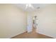 Cozy bedroom featuring beige walls and entry to ensuite bathroom at 5319 Levi Ln, Sarasota, FL 34233