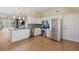 Modern kitchen with stainless steel appliances, white cabinets, granite counters and tile backsplash at 5319 Levi Ln, Sarasota, FL 34233