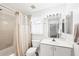 Cozy bathroom with shower, vanity, and neutral tones, offering a clean and functional space at 5330 Alseir Rd, North Port, FL 34288