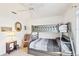 Bedroom showcasing a gray bunk bed with a ceiling fan, carpet, and natural light for a cozy atmosphere at 5330 Alseir Rd, North Port, FL 34288
