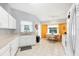 Eat-in kitchen area boasting white cabinets, neutral countertops, and natural light at 5330 Alseir Rd, North Port, FL 34288