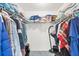Spacious walk-in closet with clothing racks and ample storage for belongings at 5330 Alseir Rd, North Port, FL 34288