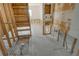 A kitchen under renovation featuring exposed plumbing and studs with a window at 537 Gunwale Ln, Longboat Key, FL 34228