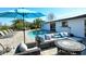 An inviting outdoor oasis features a sparkling pool, comfortable seating, and a stylish patio area for relaxation at 537 Gunwale Ln, Longboat Key, FL 34228