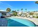 Enjoy the outdoors in this backyard oasis with a pristine pool, lounge chairs, and a cozy seating area at 537 Gunwale Ln, Longboat Key, FL 34228