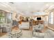 Large clubhouse with comfortable seating and a kitchen area at 615 Riviera Dunes Way # 208, Palmetto, FL 34221