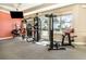 Brightly lit community gym showcasing various workout machines, large windows, and modern design at 615 Riviera Dunes Way # 208, Palmetto, FL 34221