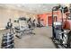 Community gym featuring modern equipment, including treadmills, ellipticals, weights, and benches at 615 Riviera Dunes Way # 208, Palmetto, FL 34221