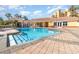 Enjoy this community pool with inviting crystal clear water and a poolside lounging area at 615 Riviera Dunes Way # 208, Palmetto, FL 34221