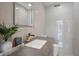 Modern bathroom features a sleek vanity with stone countertop and minimalist fixtures at 6178 9Th Avenue Ne Cir, Bradenton, FL 34212