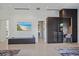 Bedroom featuring a desk, built-in storage, and a mounted television at 6178 9Th Avenue Ne Cir, Bradenton, FL 34212