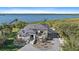 Stunning waterfront home with a private dock, lush landscaping, and a beautiful architectural design at 6178 9Th Avenue Ne Cir, Bradenton, FL 34212
