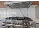 The gourmet oven features sleek stainless steel design and a modern range hood at 6178 9Th Avenue Ne Cir, Bradenton, FL 34212