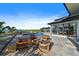 Luxury pool with comfortable outdoor seating and a tranquil water view at 6178 9Th Avenue Ne Cir, Bradenton, FL 34212