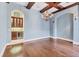 Entertainer's bar featuring wood cabinets and a wine cooler at 6211 Legends Blvd, Bradenton, FL 34210