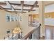 A grand foyer featuring high ceilings, exposed wood beams, and a stunning chandelier at 6211 Legends Blvd, Bradenton, FL 34210