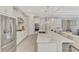 The gourmet kitchen has stainless steel appliances and a large island at 9487 Tequila Sunrise Dr, Sarasota, FL 34241