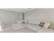 Spacious living room with plush sectional seating at 9487 Tequila Sunrise Dr, Sarasota, FL 34241