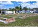 Community courts and park provide recreational space surrounded by lush landscaping at 10315 Cortez W Rd # 16E, Bradenton, FL 34210