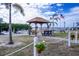 Community gazebo with park benches overlooking the waterfront and boat docks at 10315 Cortez W Rd # 16E, Bradenton, FL 34210