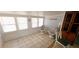 Relaxing sunroom filled with natural light, featuring tile flooring and charming decor, ideal for serene living at 10315 Cortez W Rd # 16E, Bradenton, FL 34210