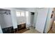 Damaged room featuring closets, floor, and walls that are visibly in need of repair at 10315 Cortez W Rd # 16E, Bradenton, FL 34210