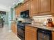 Well-equipped kitchen with stainless steel appliances and natural light at 12518 Harbour Landings Dr, Cortez, FL 34215