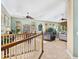 Inviting living room with tiled floors and a view from the top of the staircase at 12518 Harbour Landings Dr, Cortez, FL 34215