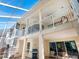 Spacious outdoor patio with spiral staircase, perfect for entertaining and outdoor enjoyment at 12518 Harbour Landings Dr, Cortez, FL 34215