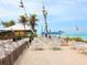 Spacious beachside outdoor restaurant with many seats and beach views at 12518 Harbour Landings Dr, Cortez, FL 34215