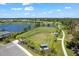 Aerial shot of the park which includes walking trails, open spaces, and lakeside views at 14147 Campfire Ct, Parrish, FL 34219