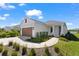 Stunning exterior view of a modern home with meticulously landscaped grounds at 14147 Campfire Ct, Parrish, FL 34219