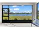 Stunning lake view from the screened lanai provides a serene backyard experience at 14147 Campfire Ct, Parrish, FL 34219