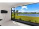 Enjoy stunning lake views from this screened lanai, featuring an outdoor television at 14147 Campfire Ct, Parrish, FL 34219