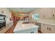 Spacious kitchen with modern appliances and convenient access to living space at 1440 Kimlira Ln, Sarasota, FL 34231