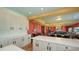 Open concept kitchen, with island, offering seamless flow to the dining and living areas at 1440 Kimlira Ln, Sarasota, FL 34231