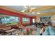 Stylish living room with water views, modern furniture, and eat-in kitchen area at 1440 Kimlira Ln, Sarasota, FL 34231