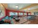 Bright living room with water views features modern furniture and fixtures at 1440 Kimlira Ln, Sarasota, FL 34231
