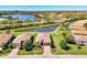 Beautiful home with lake view, lush landscaping, and tile roof in a desirable community at 167 Wandering Wetlands Cir, Bradenton, FL 34212
